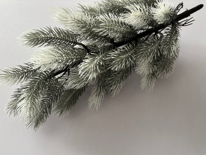 Small Snowy Spruce Tree